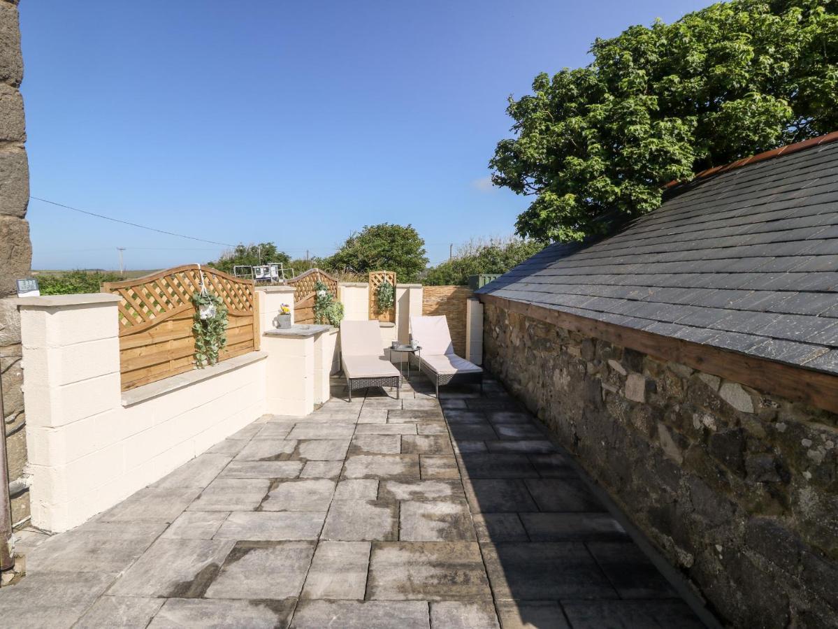 Bwthyn Siop Pencaerau Hébergement de vacances *